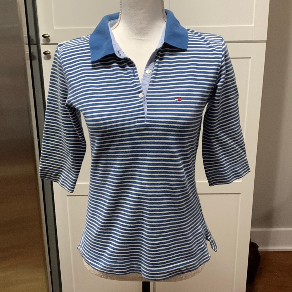 Tommy ladies blouse. Says M but runs S